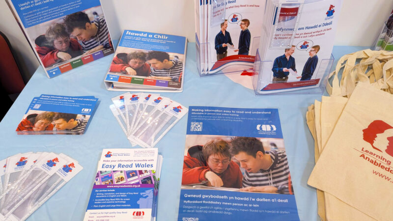 Easy Read Wales resource materials on a table.